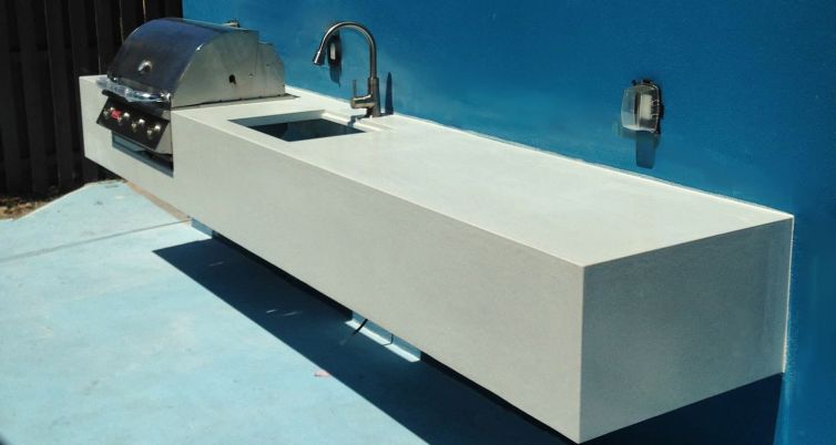 Floating Outdoor White Concrete Countertop with Inset BBQ Grill and Sink