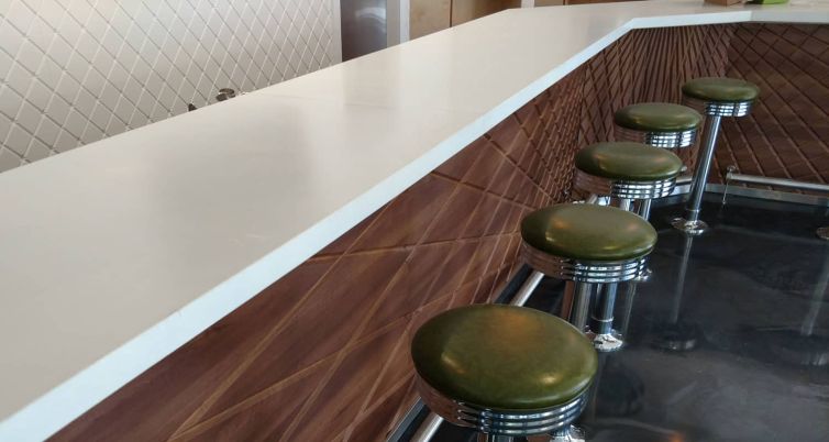 Clean, Modern White Concrete Countertop in a diner in St Petersburg FL